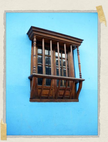 The bright blue houses were always the first to catch my eye during our walks through town 'The bright blue houses were always the first to catch my eye during our walks through town