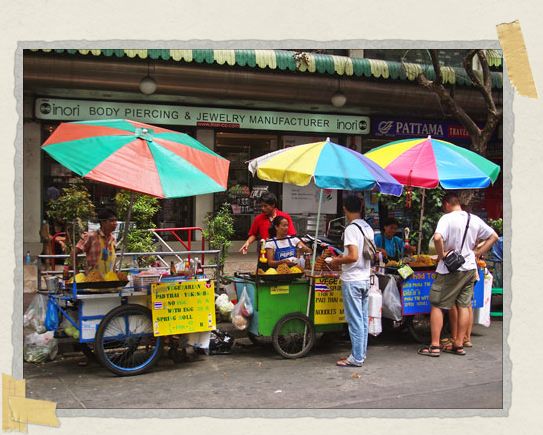 Locals and tourists alike frequent the pad thai foodstalls 'Locals and tourists alike frequent the pad thai foodstalls