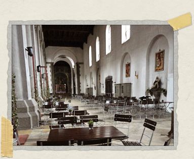 'Just behind where this photo was taken, are the tables where the kegs stand. And yes, you're seeing correctly: this beerhouse is inside the church, to the right of the pews.
